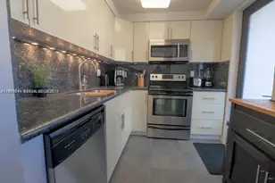 301 Golden Isles Dr, Hallandale Beach, FL 33009 - Photo 1