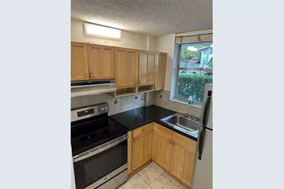 1801 S Treasure Dr #102, North Bay Village, FL 33141 - Photo 3