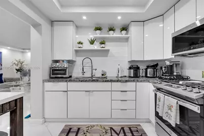 18111 NW 68th Ave #G104, Hialeah, FL 33015 - Photo 7
