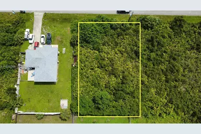 E 3006 W64, Lehigh Acres, FL 33971 - Photo 3