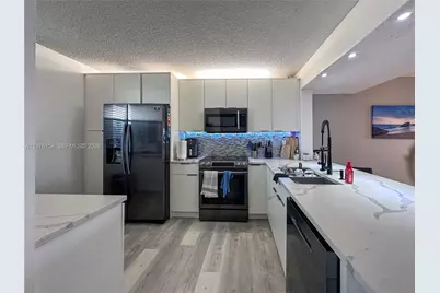 2766 S Carambola Cir S #404, Coconut Creek, FL 33066 - Photo 5