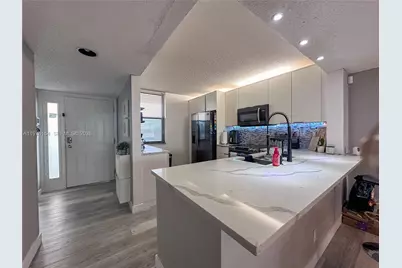 2766 S Carambola Cir S #404, Coconut Creek, FL 33066 - Photo 3