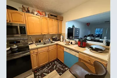 6070 W 18th Ave #209, Hialeah, FL 33012 - Photo 5