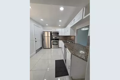 1351 NE 191st St #E420, Miami, FL 33179 - Photo 7