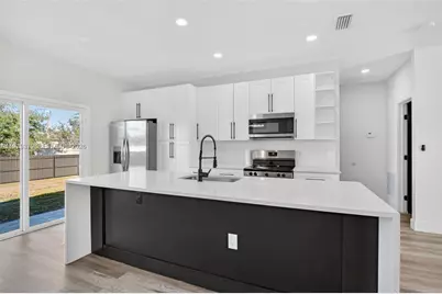 710 Bedford Point Ave, Lehigh Acres, FL 33974 - Photo 9