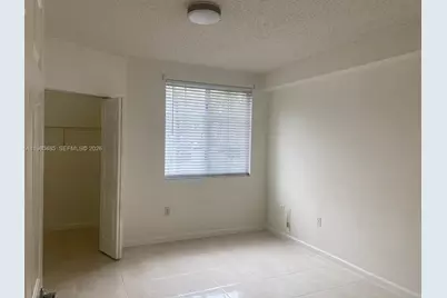 7980 N Nob Hill Rd #107, Tamarac, FL 33321 - Photo 7