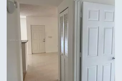 7980 N Nob Hill Rd #107, Tamarac, FL 33321 - Photo 3