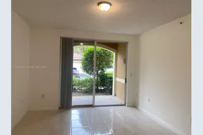 7980 N Nob Hill Rd #107, Tamarac, FL 33321 - Photo 15