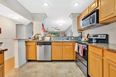 3777 NW 78th Ave #15G, Davie, FL 33024 - Photo 1