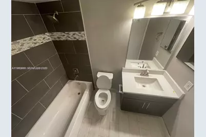 2811 N Oakland Forest Dr #110, Oakland Park, FL 33309 - Photo 7