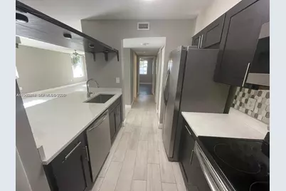 2811 N Oakland Forest Dr #110, Oakland Park, FL 33309 - Photo 13