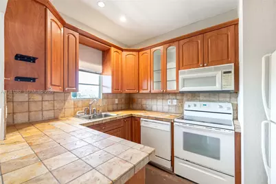2225 NE 123rd St #215, North Miami, FL 33181 - Photo 11