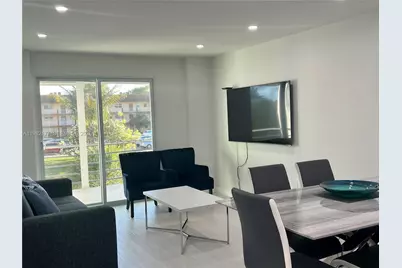 8595 Sunrise Lakes Blvd #207, Sunrise, FL 33322 - Photo 1