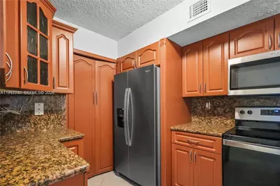 3844 Lyons Rd #112-4, Coconut Creek, FL 33073 - Photo 9