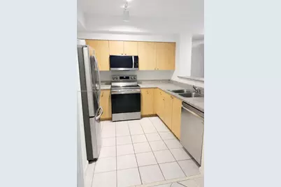 7940 N Nob Hill Rd #102, Tamarac, FL 33321 - Photo 5