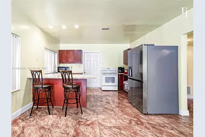 1195 NW 48th St, Miami, FL 33127 - Photo 7
