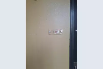 301 Golden Isles Dr #110, Hallandale Beach, FL 33009 - Photo 1