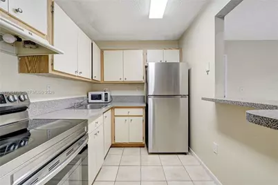 7160 NW 179th St #211, Hialeah, FL 33015 - Photo 17