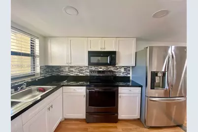 8975 Palm Tree Ln #8975, Pembroke Pines, FL 33024 - Photo 1