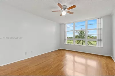 3970 Oaks Clubhouse Dr #407, Pompano Beach, FL 33069 - Photo 11