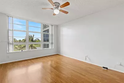 3970 Oaks Clubhouse Dr #407, Pompano Beach, FL 33069 - Photo 11