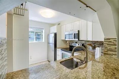 3095 N Oakland Forest Dr #104, Oakland Park, FL 33309 - Photo 11