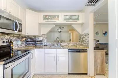 3095 N Oakland Forest Dr #104, Oakland Park, FL 33309 - Photo 9