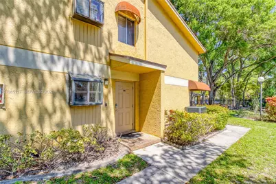 3095 N Oakland Forest Dr #104, Oakland Park, FL 33309 - Photo 1