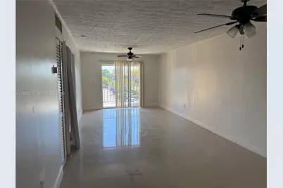 6055 W 19th Ave #311, Hialeah, FL 33012 - Photo 1