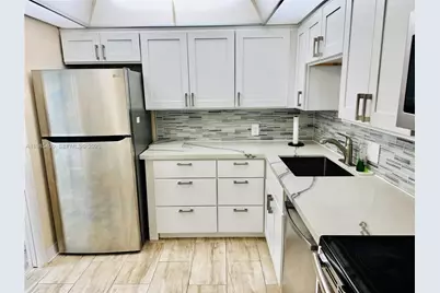 2601 S Course Dr #409, Pompano Beach, FL 33069 - Photo 3