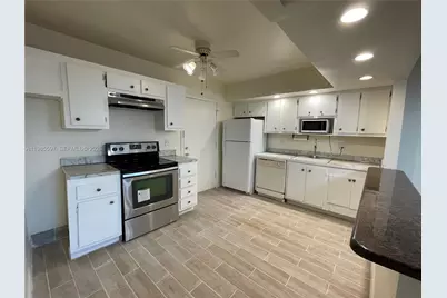 2061 NW 47th Ter #306, Lauderhill, FL 33313 - Photo 1