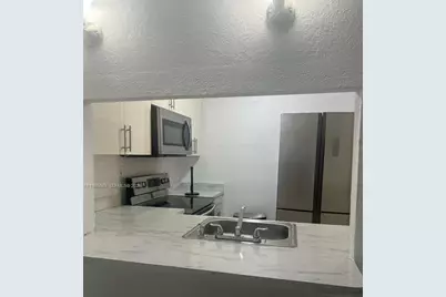 4550 NW 9th St #114E, Miami, FL 33126 - Photo 1