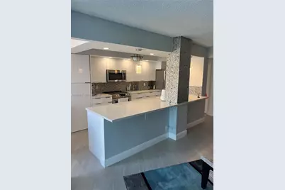100 Golden Isles Dr #205, Hallandale Beach, FL 33009 - Photo 9