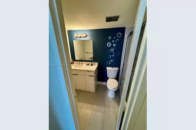 100 Golden Isles Dr #205, Hallandale Beach, FL 33009 - Photo 21
