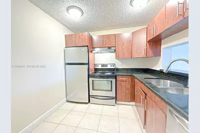 484 NW 165th St Rd #A-412, Miami, FL 33169 - Photo 1