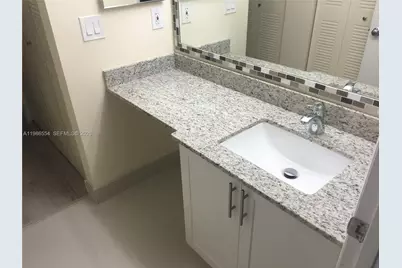 2831 N Oakland Forest Dr #112, Oakland Park, FL 33309 - Photo 15