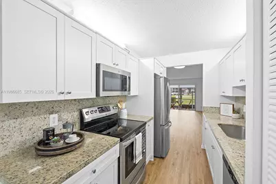 1401 SW 128th Ter #103H, Pembroke Pines, FL 33027 - Photo 1