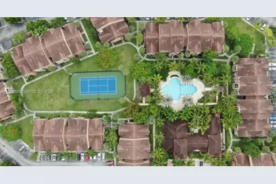 8000 N Nob Hill Rd #107, Tamarac, FL 33321 - Photo 7