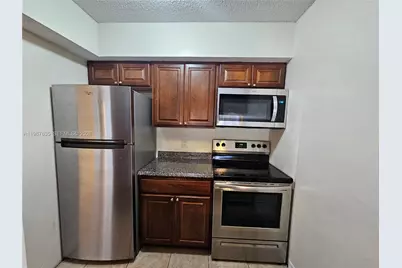 5686 Rock Island Rd #126, Tamarac, FL 33319 - Photo 9