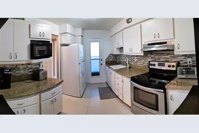 400 Golden Isles Dr #10, Hallandale Beach, FL 33009 - Photo 13