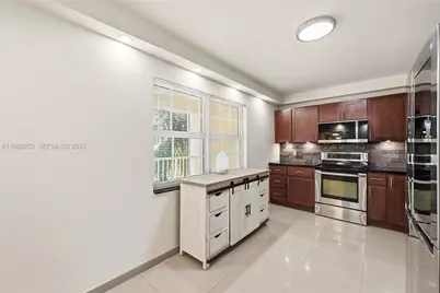 3520 Oaks Way #407, Pompano Beach, FL 33069 - Photo 5