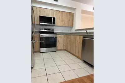 8000 N Nob Hill Rd #206, Tamarac, FL 33321 - Photo 11