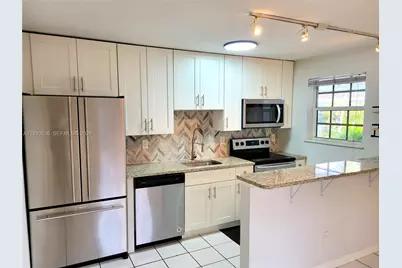 125 NW 25th St #129, Wilton Manors, FL 33311 - Photo 1