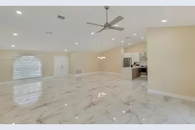 10425 NW 48th Mnr #1, Coral Springs, FL 33076 - Photo 3