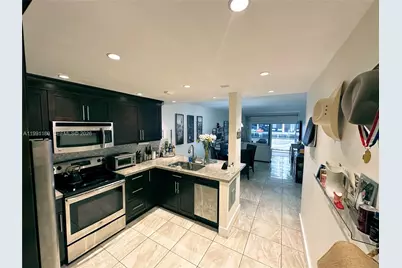 450 Paradise Isle Blvd #102, Hallandale Beach, FL 33009 - Photo 1