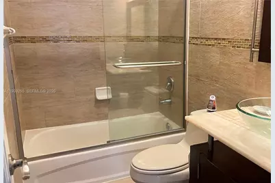 401 Golden Isles Dr #101, Hallandale Beach, FL 33009 - Photo 7