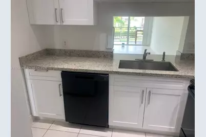 7435 Woodmont Ter #202, Tamarac, FL 33321 - Photo 15