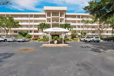 3970 Oaks Clubhouse Dr #302, Pompano Beach, FL 33069 - Photo 1