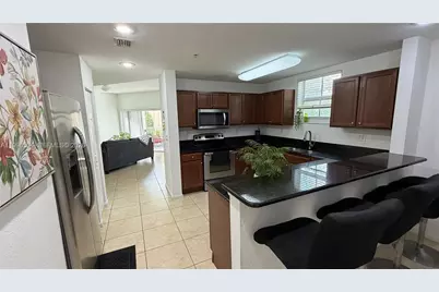 11605 NW 89th St #220, Doral, FL 33178 - Photo 1