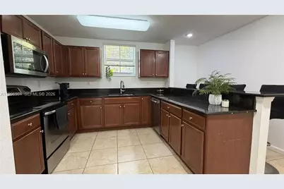 11605 NW 89th St #220, Doral, FL 33178 - Photo 5